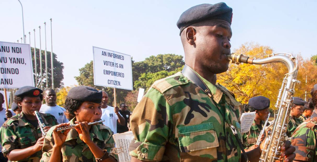 Malawi Electoral Commission staff, accredited civil society organizations, members of the public, and members of the Malawi Defense Forces military band march in Lilongwe to mark the official beginning of the electoral period ahead of the 2025 Malawi General Elections